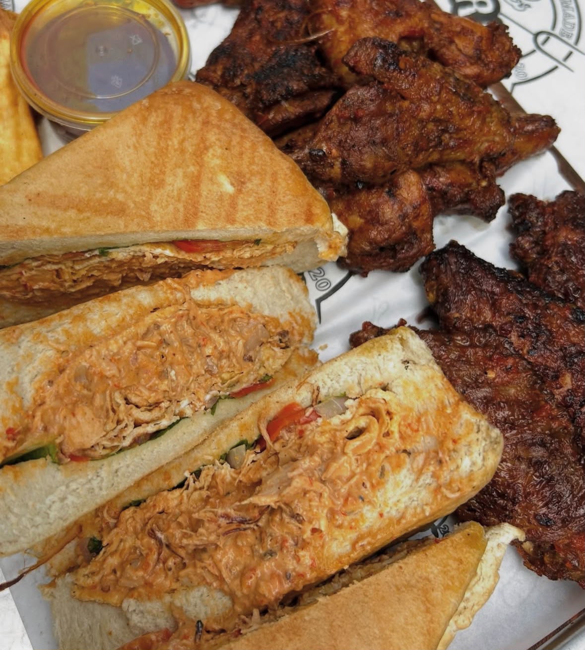 Advanced full agege sandwich + 2 chicken wings + 2 sausage + yam fries & potatoes + 2 sweet corn